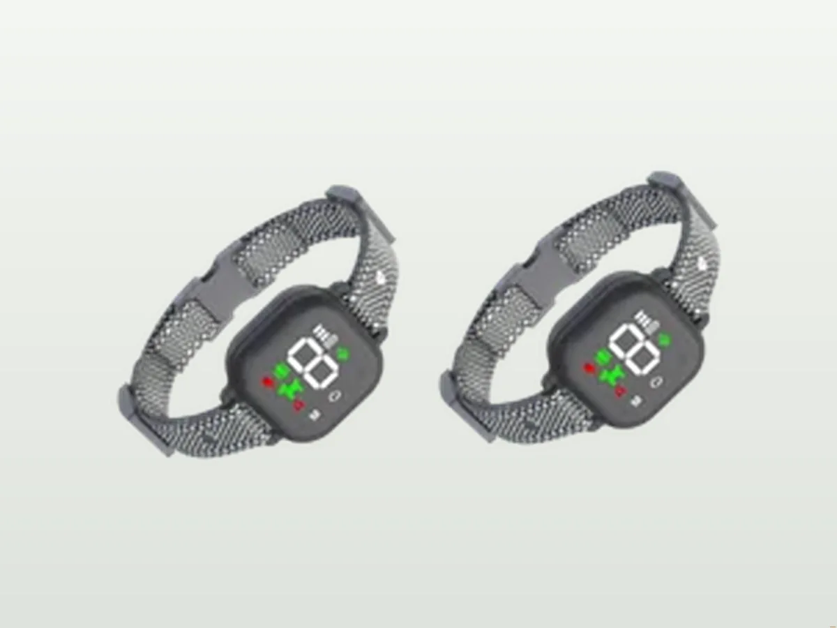 Two Hush Bark Smart Collars showing digital LED displays and reflective straps